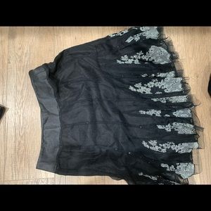 Black skirt with white flowers